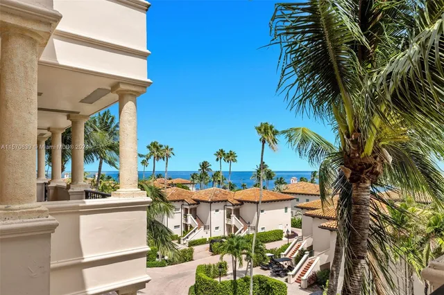 a view of a lake with a yard