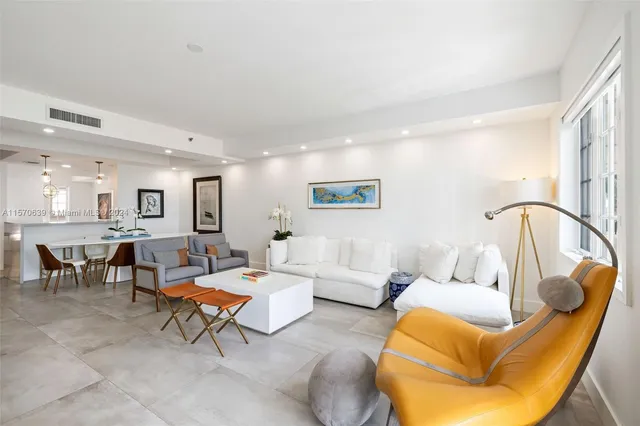 a living room with furniture and a table