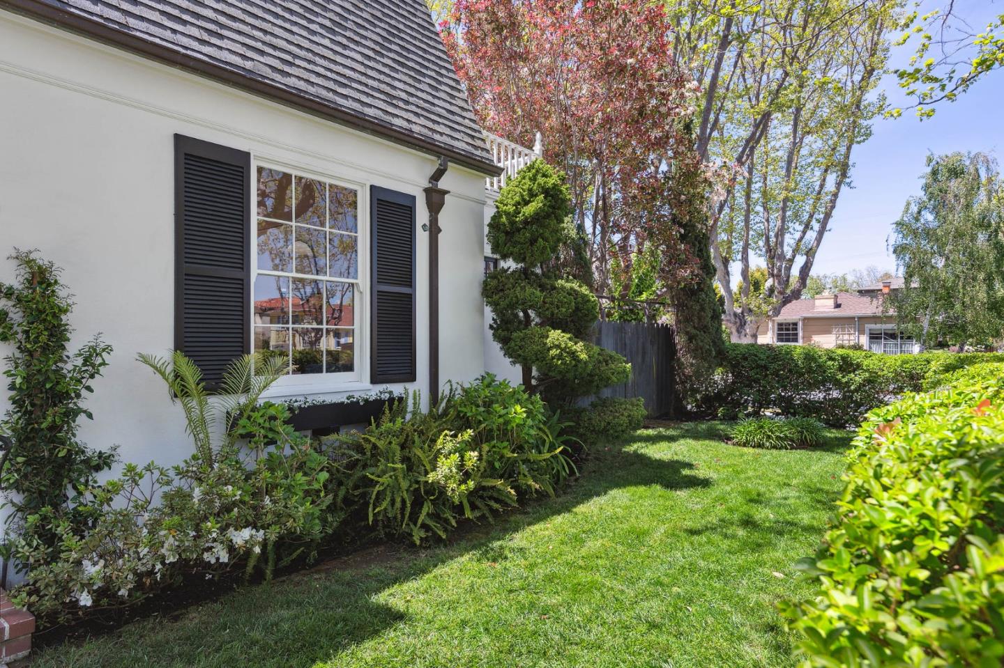 321 Bloomfield Road Burlingame, CA 94010 - Photo 1 of 45 front view of a house with a yard