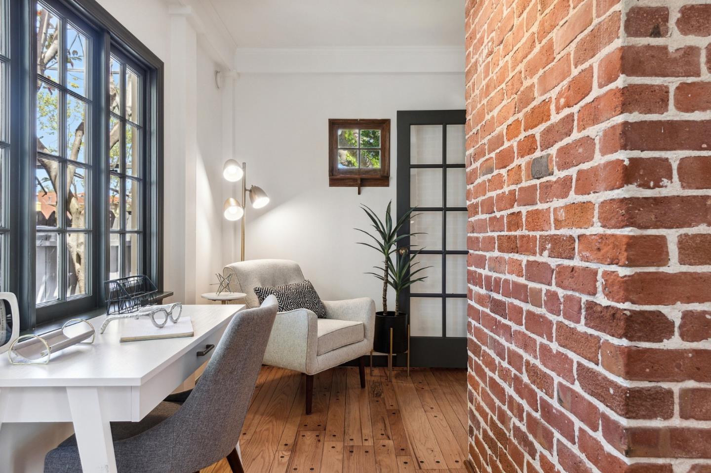 321 Bloomfield Road Burlingame, CA 94010 - Photo 11 of 45 a living room with a sink and a mirror