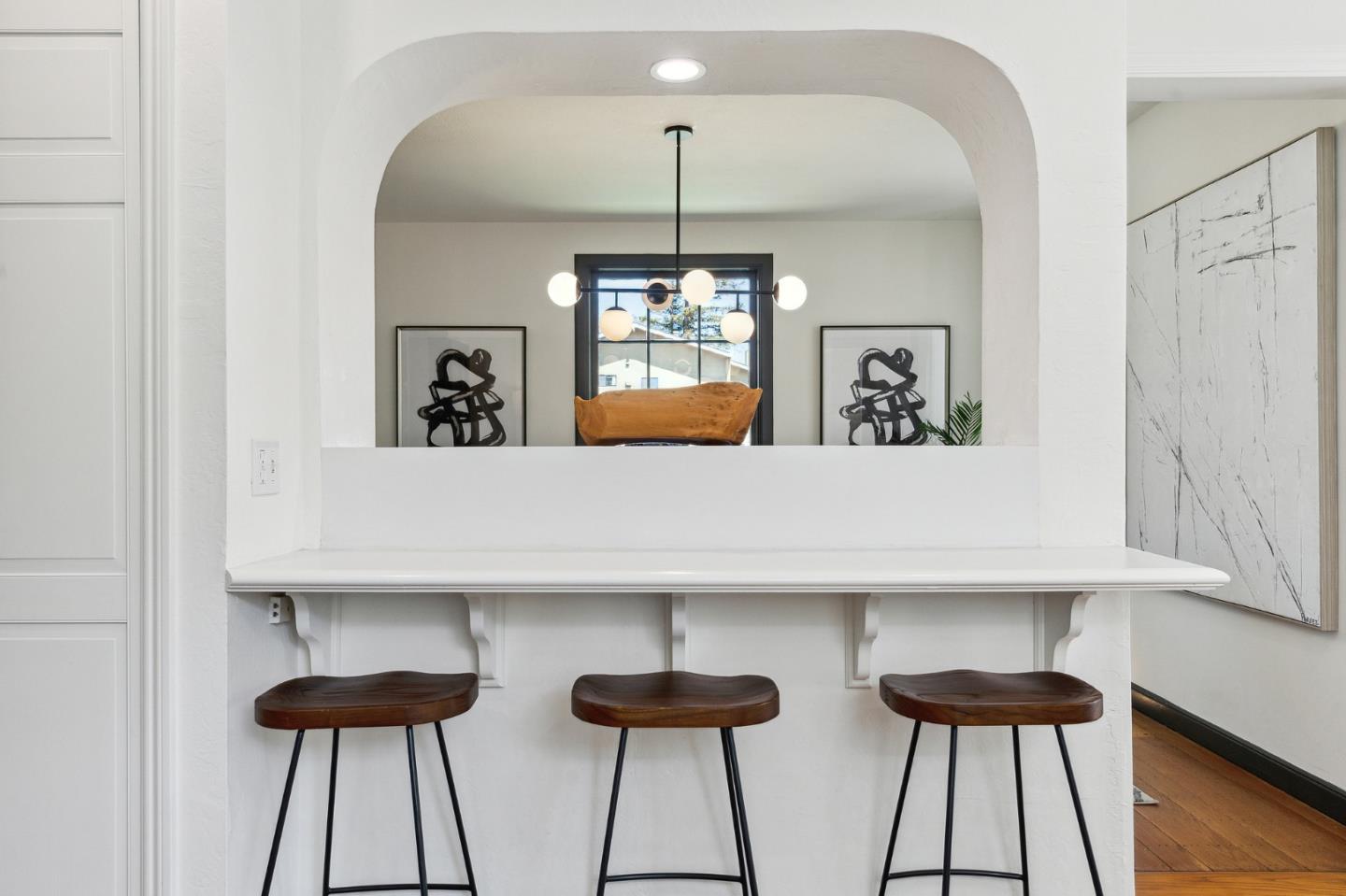 321 Bloomfield Road Burlingame, CA 94010 - Photo 17 of 45 a room with two chairs and a large mirror