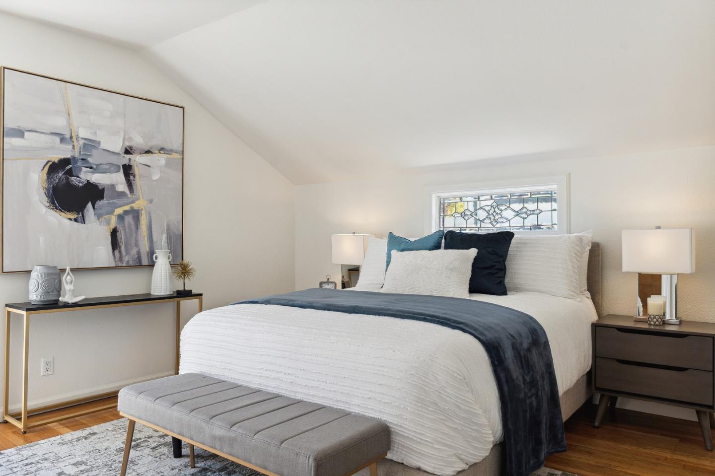 321 Bloomfield Road Burlingame, CA 94010 - Photo 23 of 45 a bedroom with a bed and wooden floor