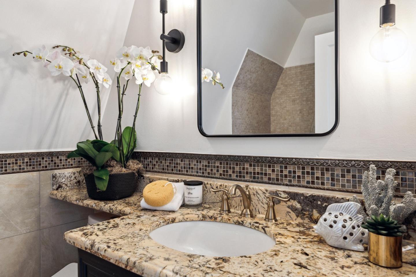 321 Bloomfield Road Burlingame, CA 94010 - Photo 26 of 45 a bathroom with a sink and a mirror
