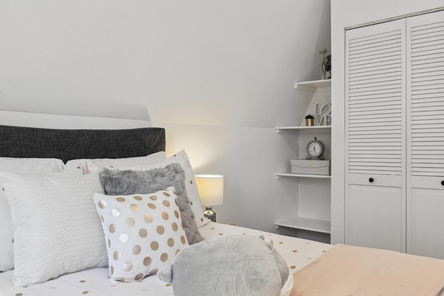 321 Bloomfield Road Burlingame, CA 94010 - Photo 28 of 45 a bedroom with a bed and a window