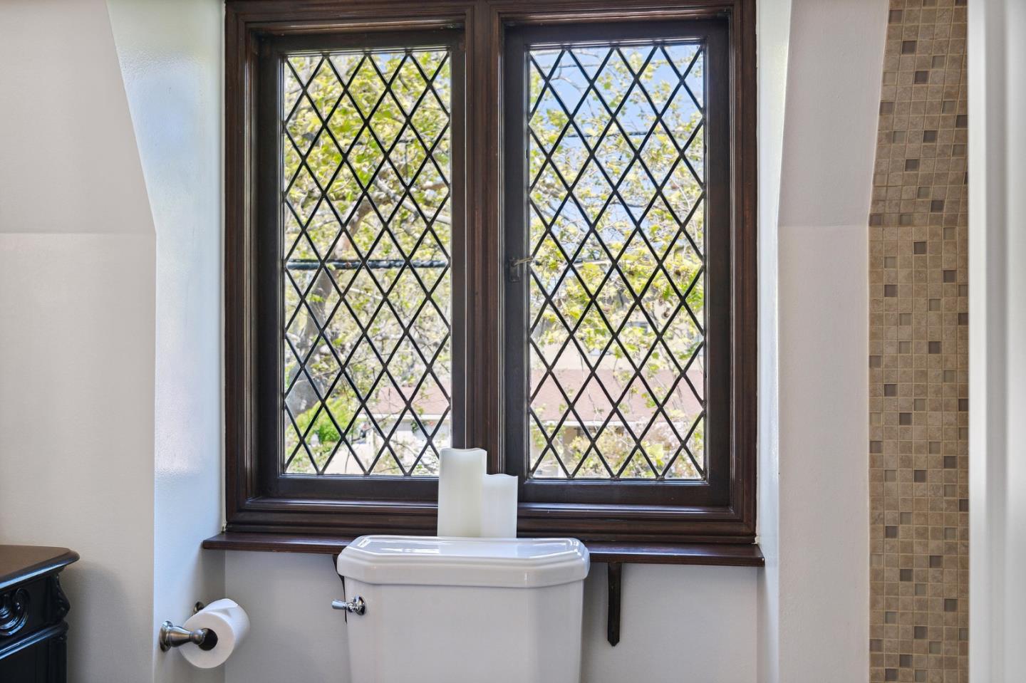 321 Bloomfield Road Burlingame, CA 94010 - Photo 31 of 45 a bathroom with a toilet and a shower curtain