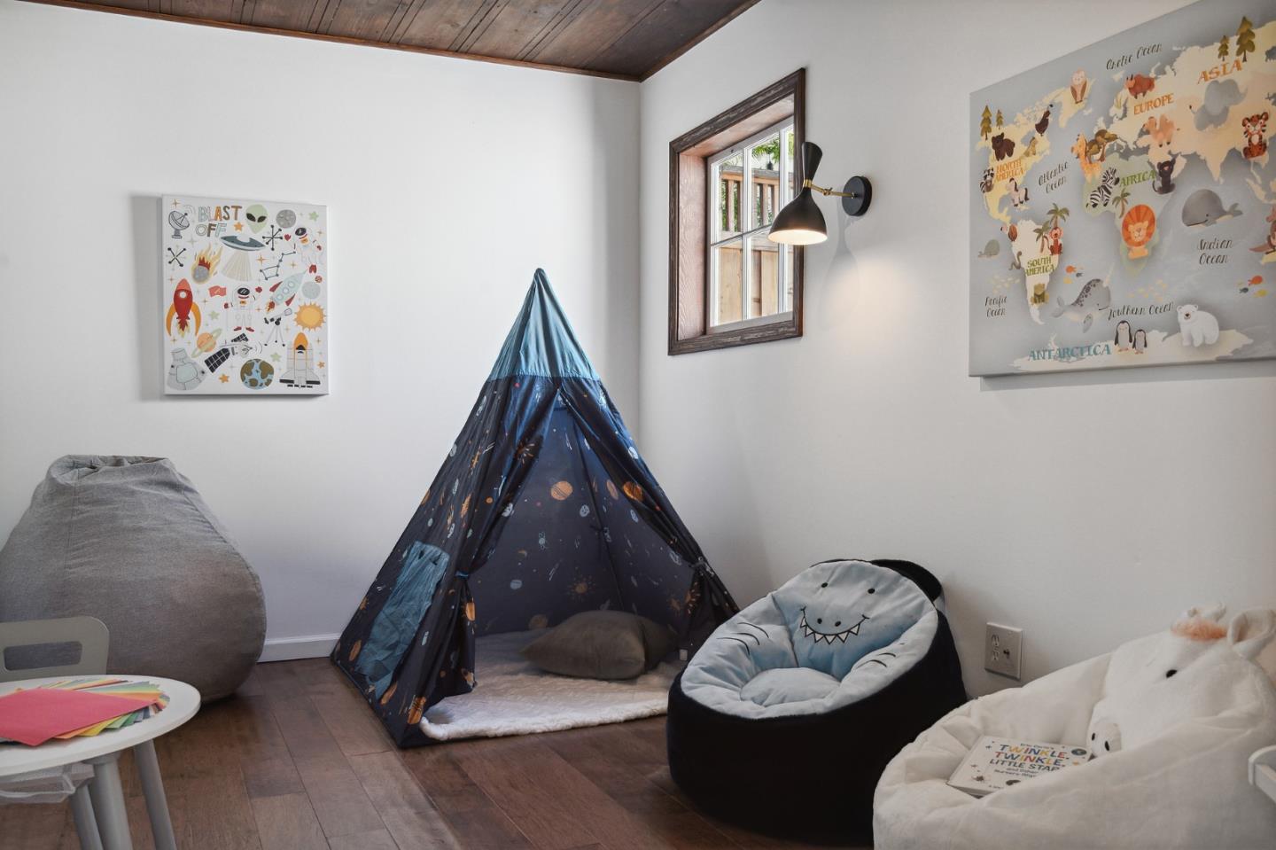 321 Bloomfield Road Burlingame, CA 94010 - Photo 40 of 45 a living room with furniture and baby crib