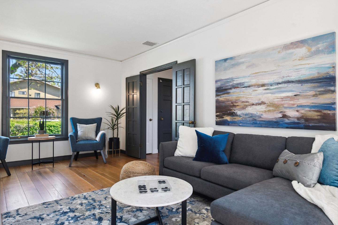 321 Bloomfield Road Burlingame, CA 94010 - Photo 9 of 45 a living room with furniture and wooden floor