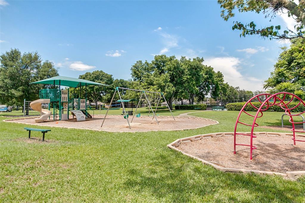 2125 Kane Park Way Windermere, FL 34786 - Photo 53 of 63 a view of a park with swings