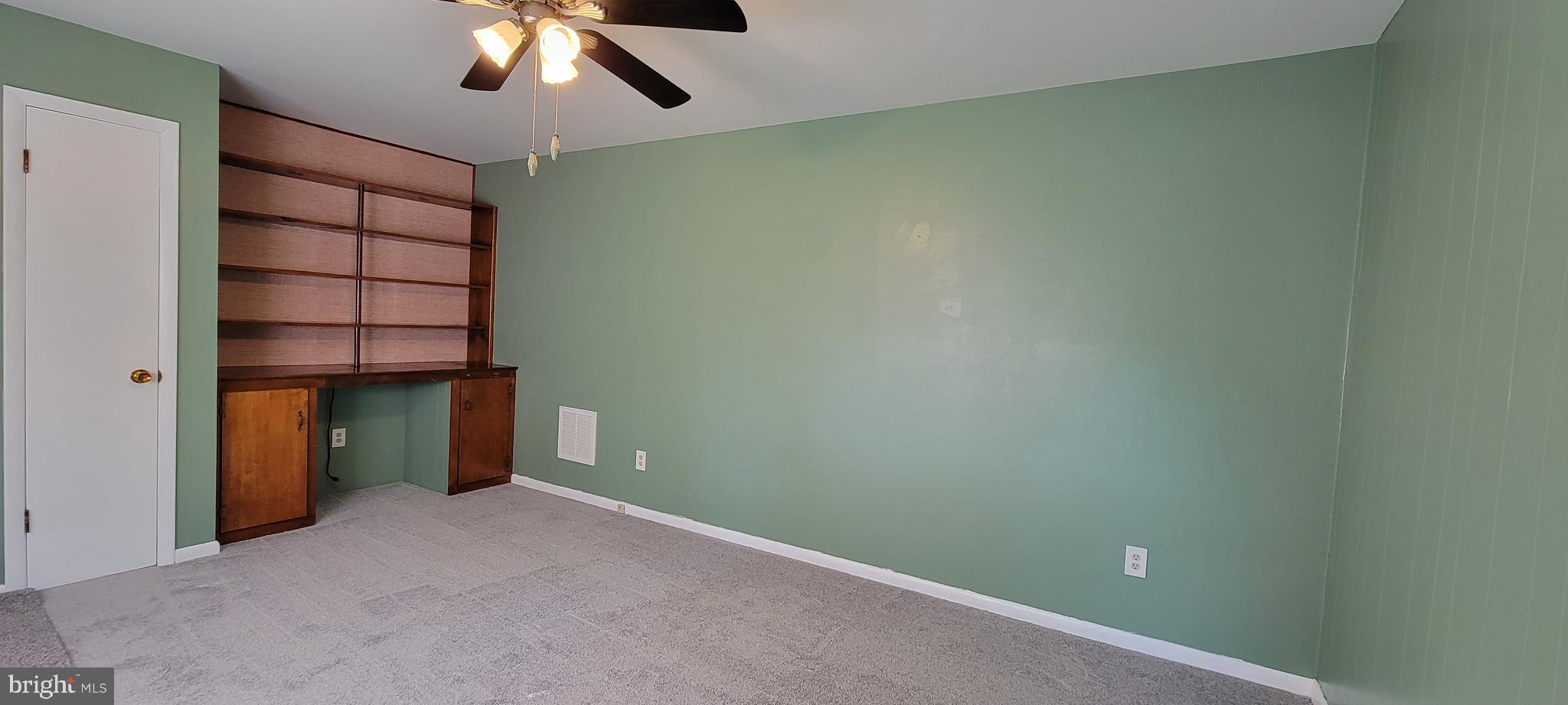 32 Center Street Boonsboro, MD 21713 - Photo 6 of 31 Living Room with Built in Desk and Shelving