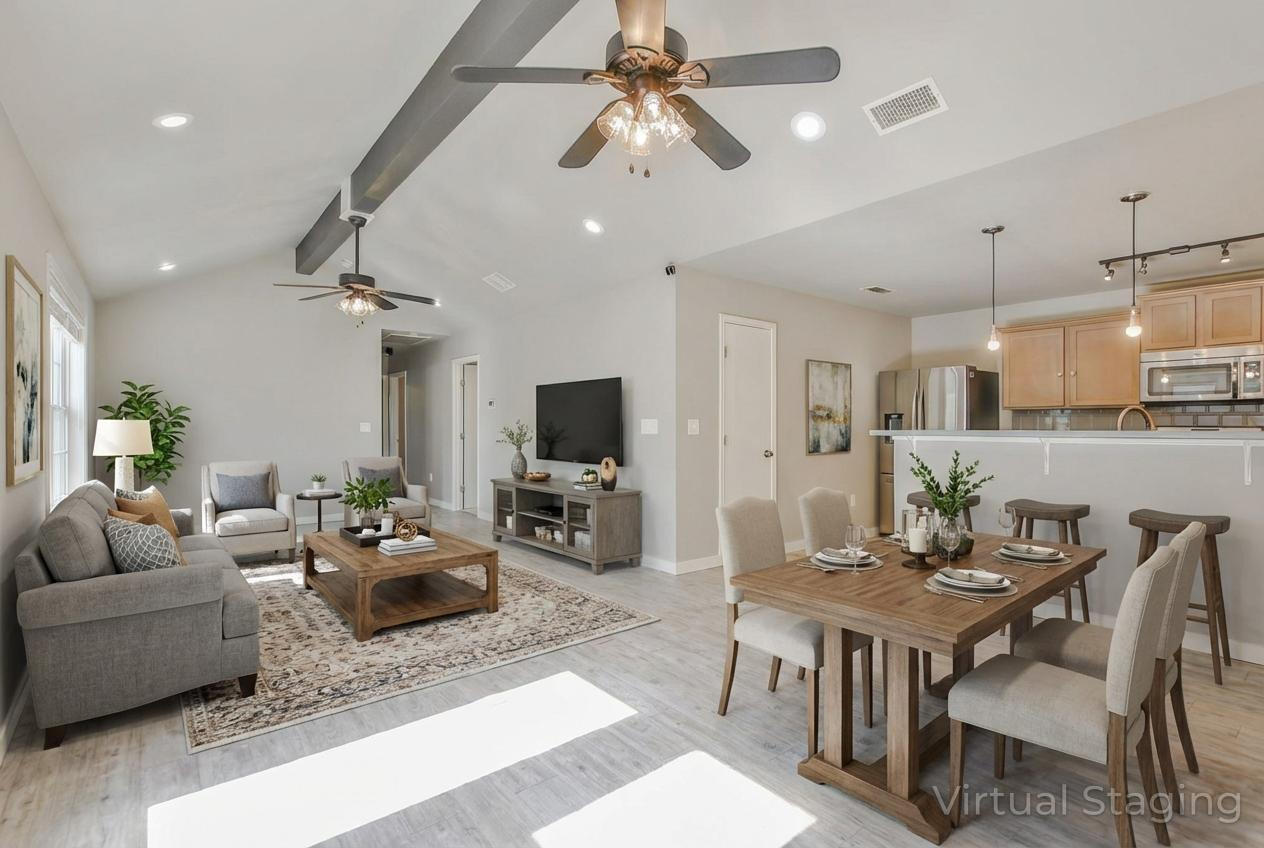 6205 21st Street Lubbock, TX 79407 - Photo 1 of 22 a living room with furniture kitchen view and a flat screen tv