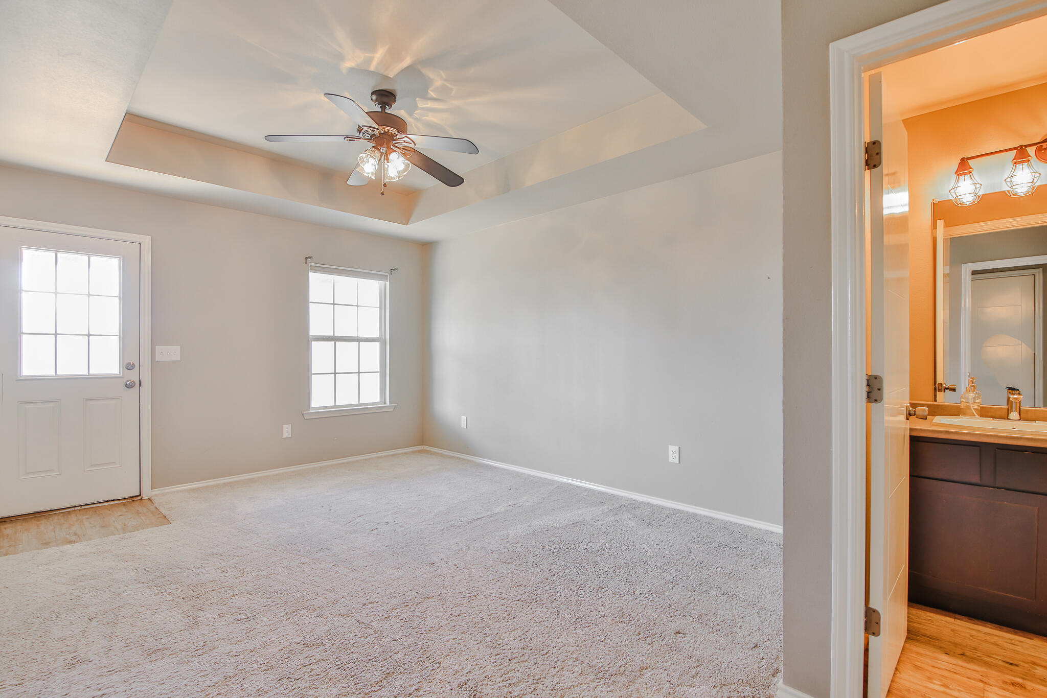 6205 21st Street Lubbock, TX 79407 - Photo 11 of 22 a view of an empty room with a window