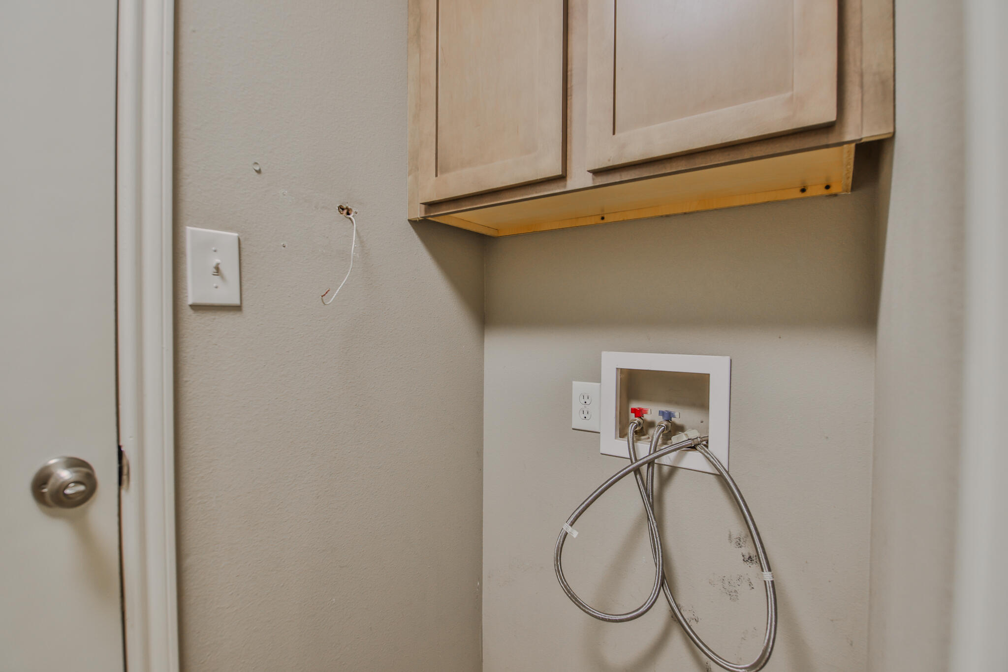 6205 21st Street Lubbock, TX 79407 - Photo 19 of 22 a bathroom with a sink and a mirror