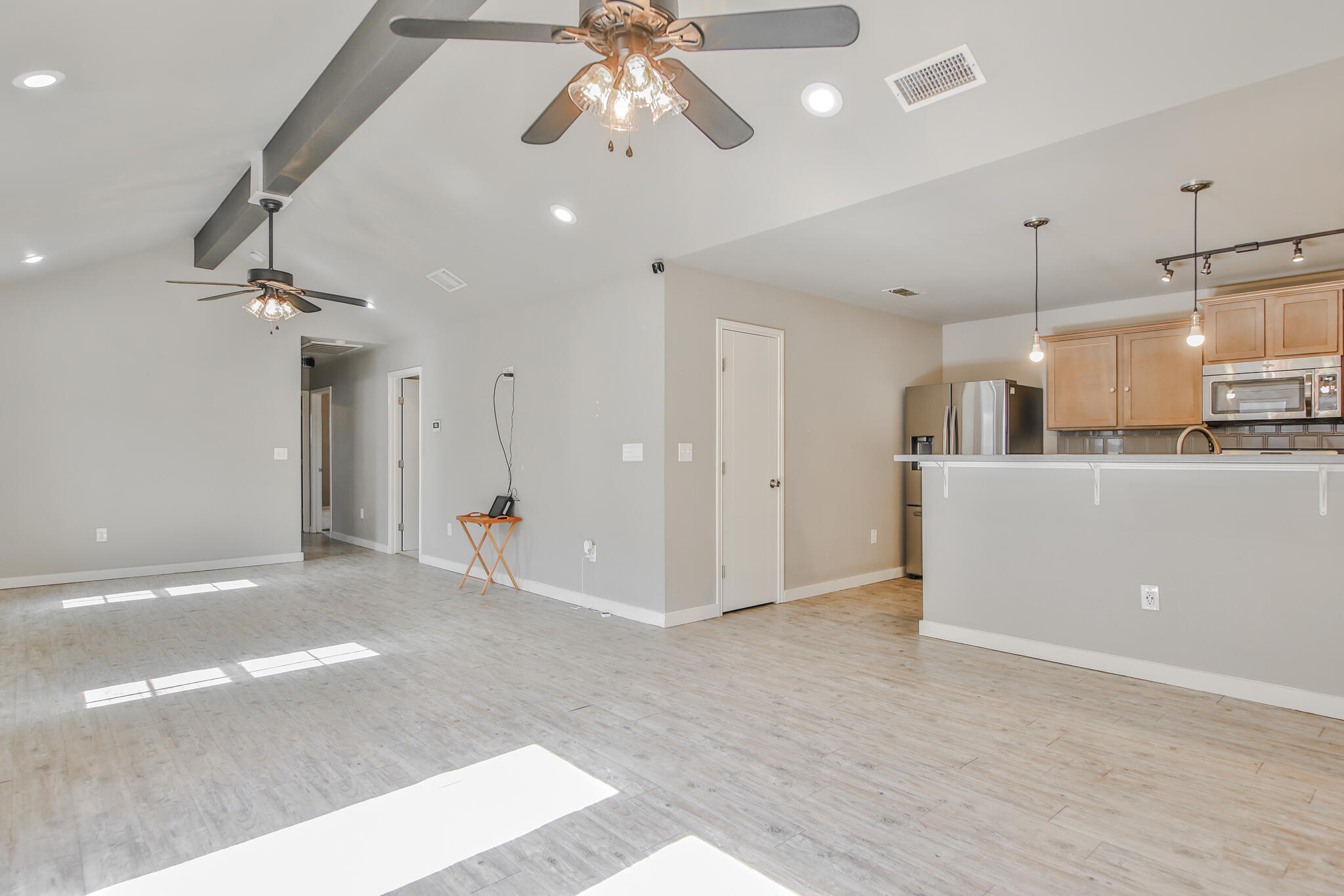 6205 21st Street Lubbock, TX 79407 - Photo 2 of 22 a view of a kitchen with a sink and cabinet area