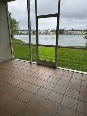a view of a terrace with a lake view