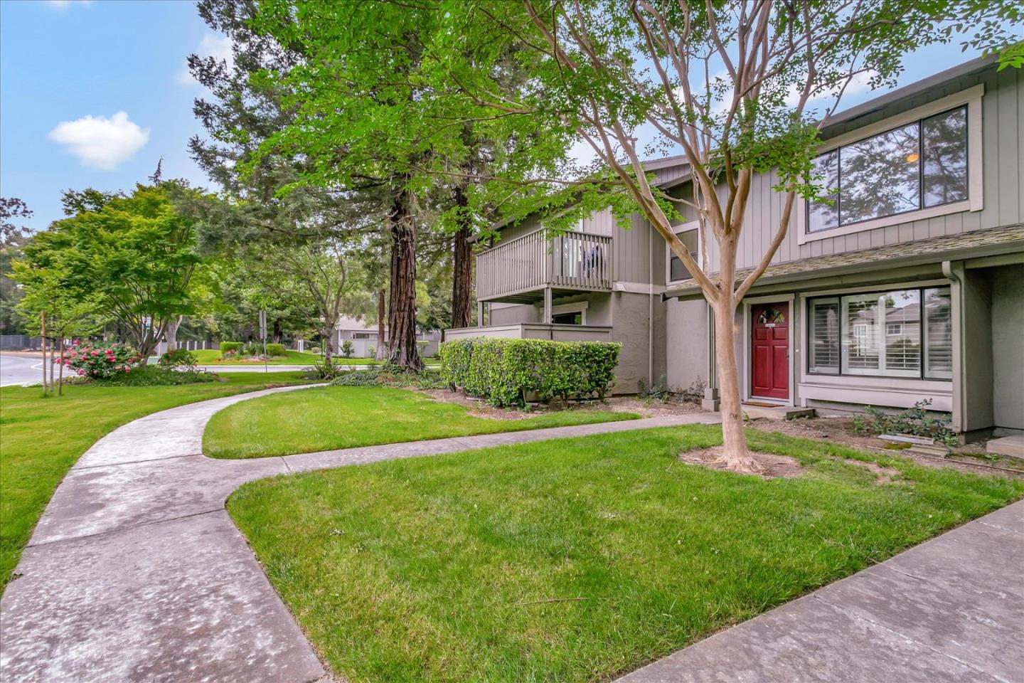 94 Saddlebrook Drive San Jose, CA 95136 - Photo 3 of 32 a view of a house with a yard and tree s