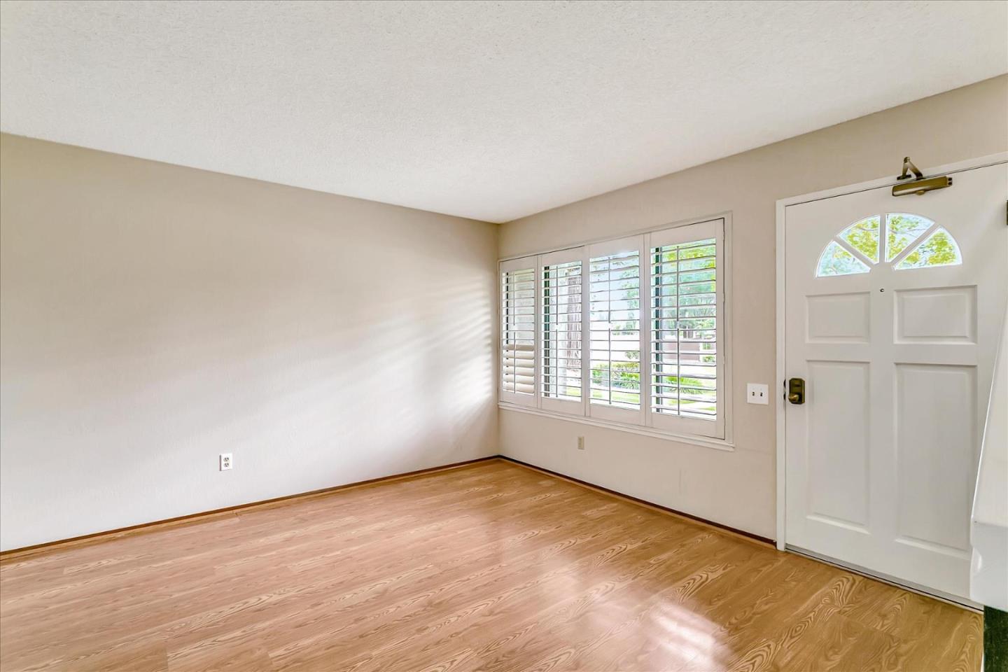 94 Saddlebrook Drive San Jose, CA 95136 - Photo 4 of 32 an empty room with windows