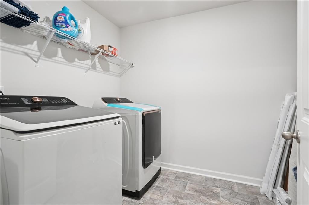 177 Treeline Trail Canton, GA 30115 - Photo 38 of 66 a utility room with dryer and washer