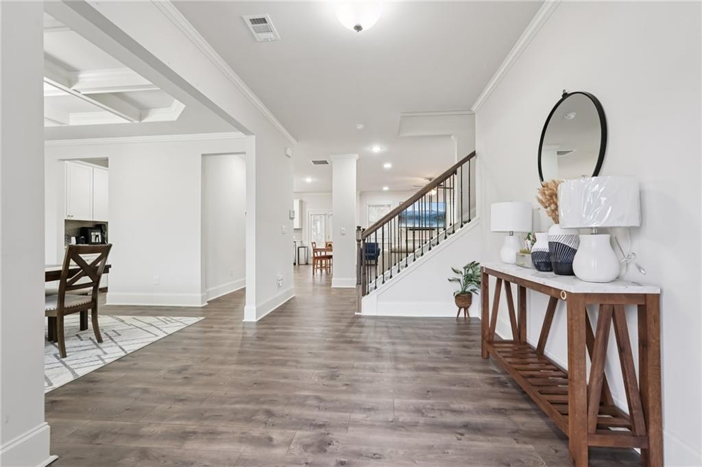 177 Treeline Trail Canton, GA 30115 - Photo 4 of 66 a view of entryway and hall with wooden floor