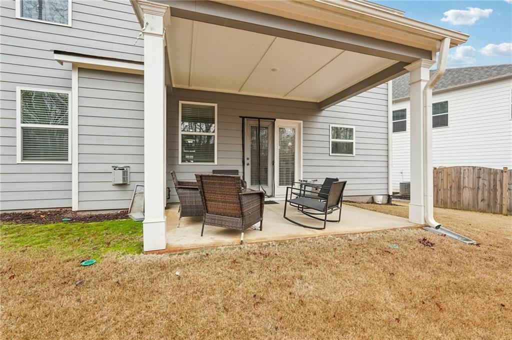 177 Treeline Trail Canton, GA 30115 - Photo 55 of 66 a view of a house with backyard and sitting area