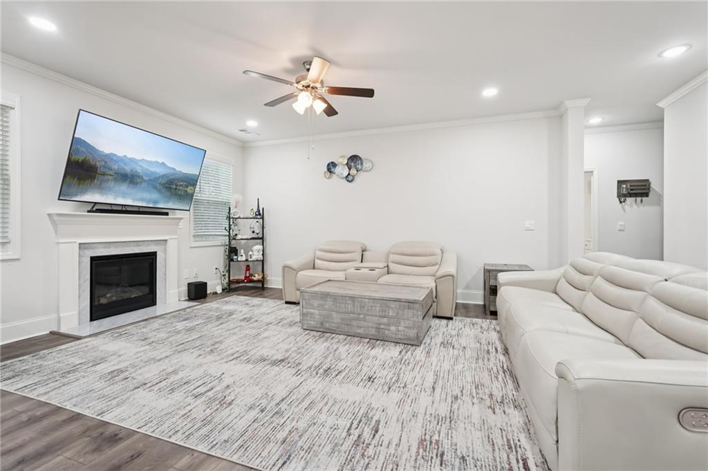 177 Treeline Trail Canton, GA 30115 - Photo 10 of 66 a living room with furniture and a fireplace