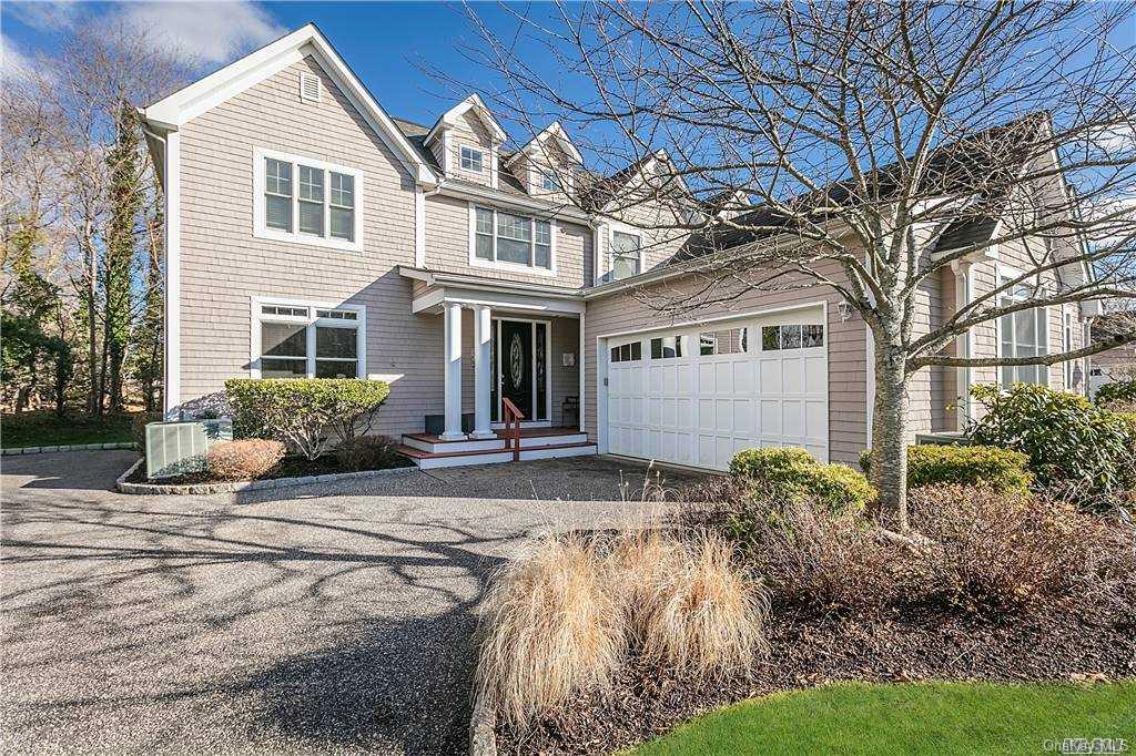 180 Main Street Westhampton Beach, NY 11978 - Photo 1 of 1 front view of a house with a yard