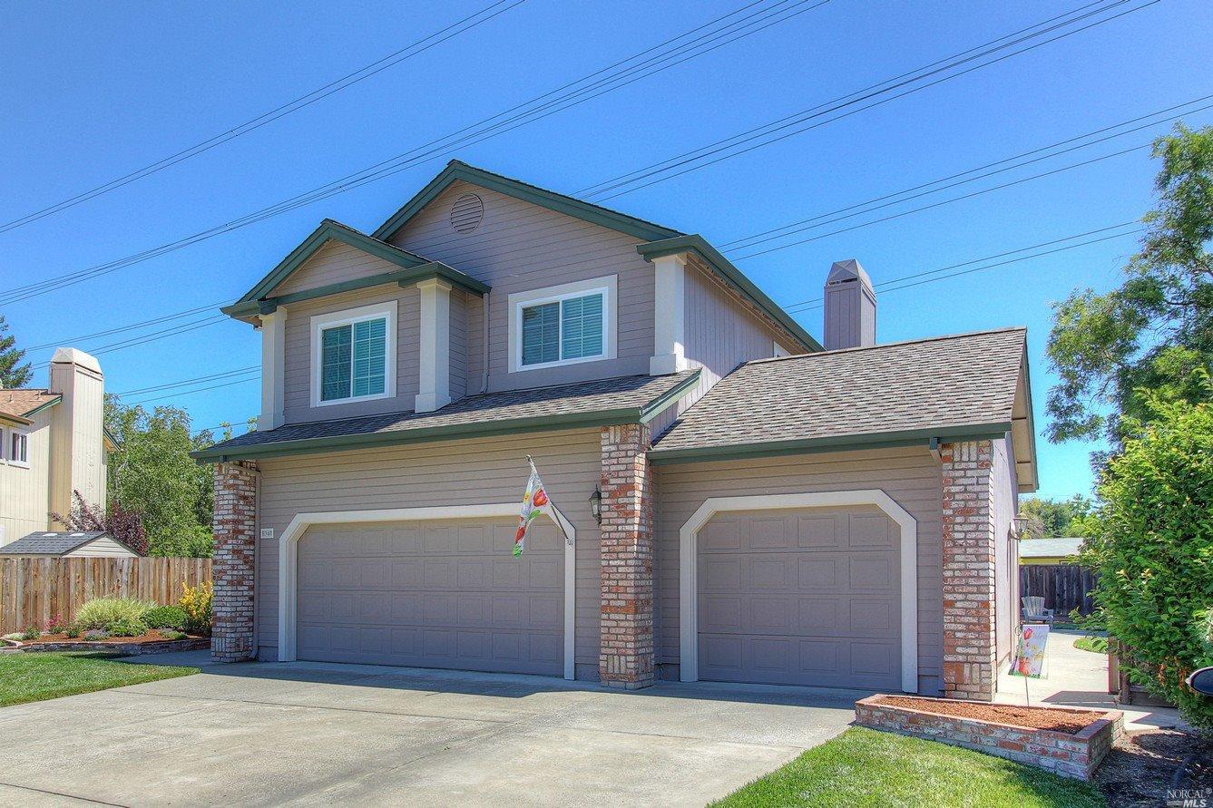 38 Noonan Ranch Circle Santa Rosa, CA 95403 - Photo 1 of 1 a front view of a house with a yard and garage