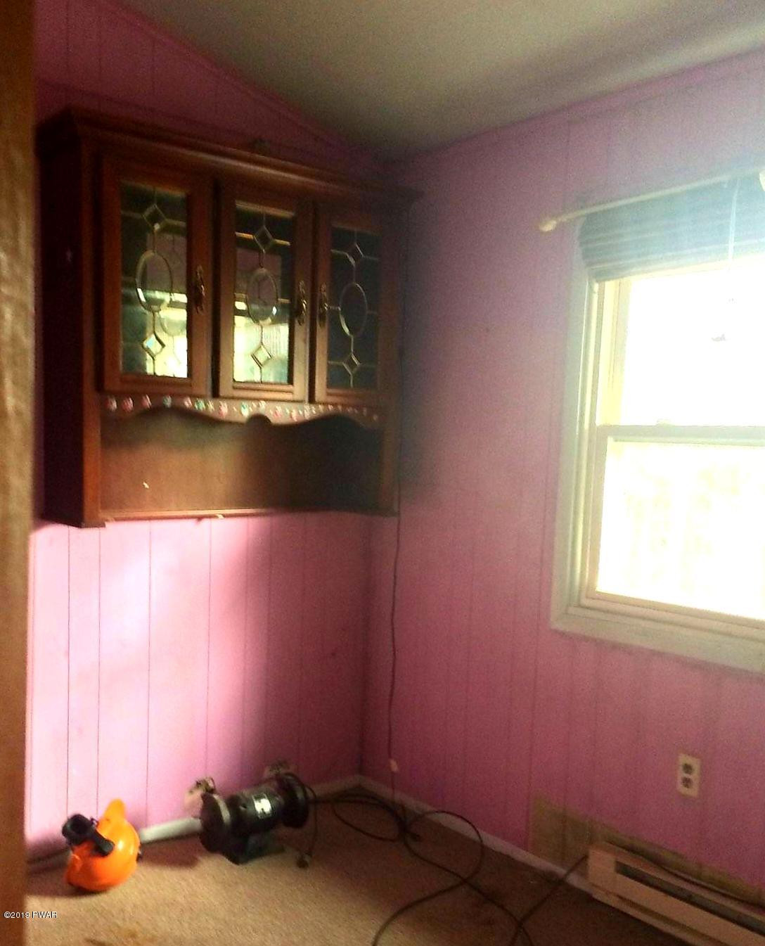 133 Panda Road Dingmans Ferry, PA 18328 - Photo 6 of 11 view of room with window