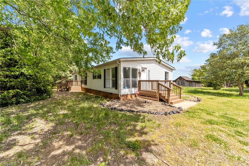 8321 Haw River Road Oak Ridge, NC 27310 - Photo 2 of 37