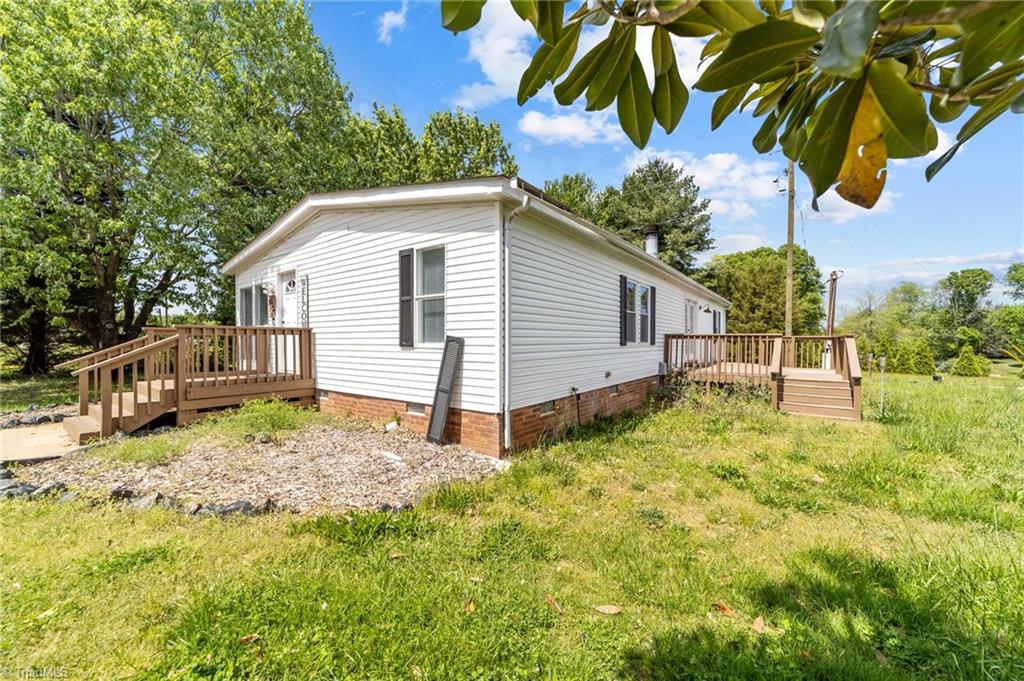 8321 Haw River Road Oak Ridge, NC 27310 - Photo 4 of 37