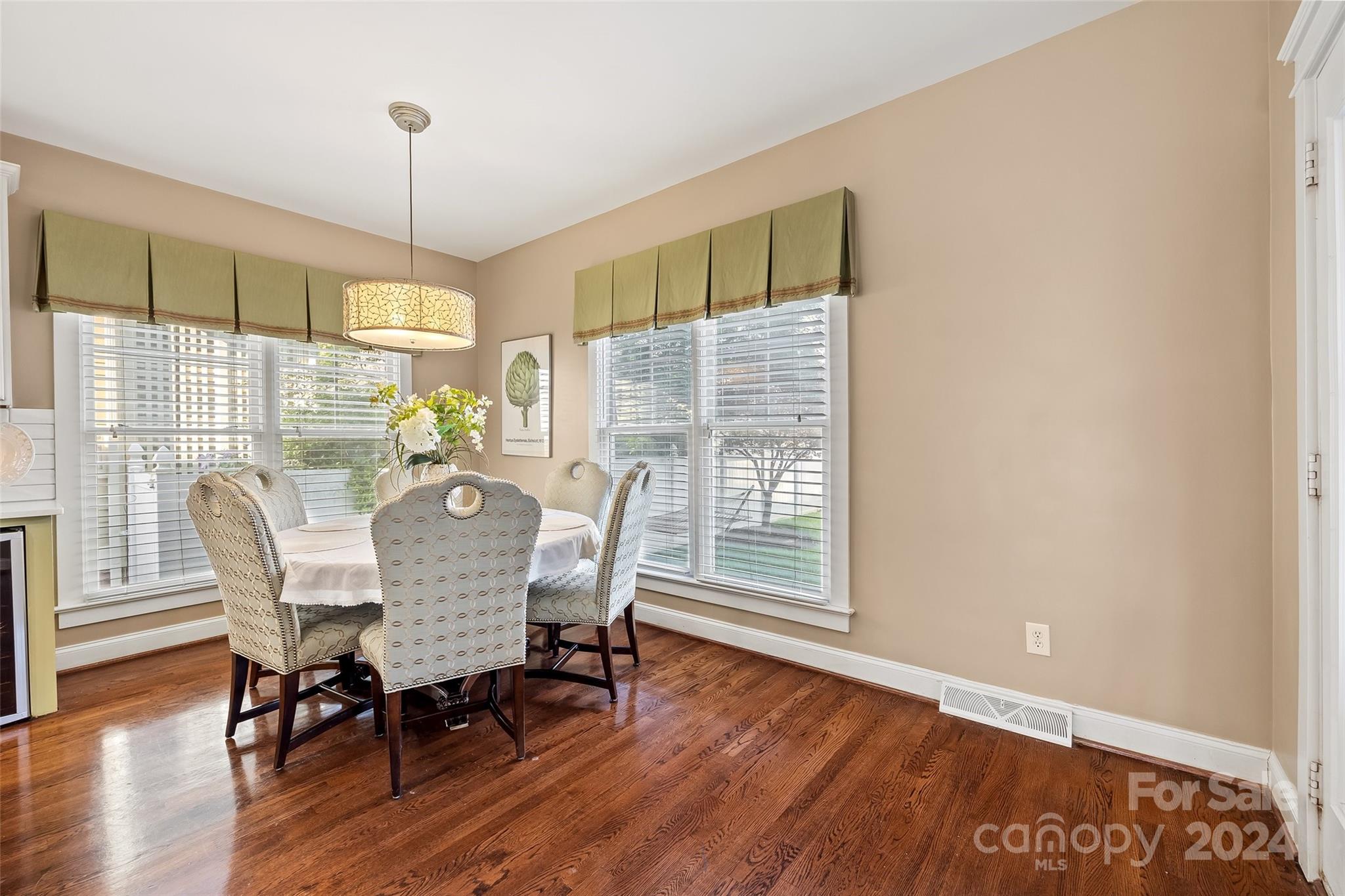 422 Bull Finch Bend Fort Mill, SC 29708 - Photo 12 of 48 a view of a dining room with furniture window and wooden floor