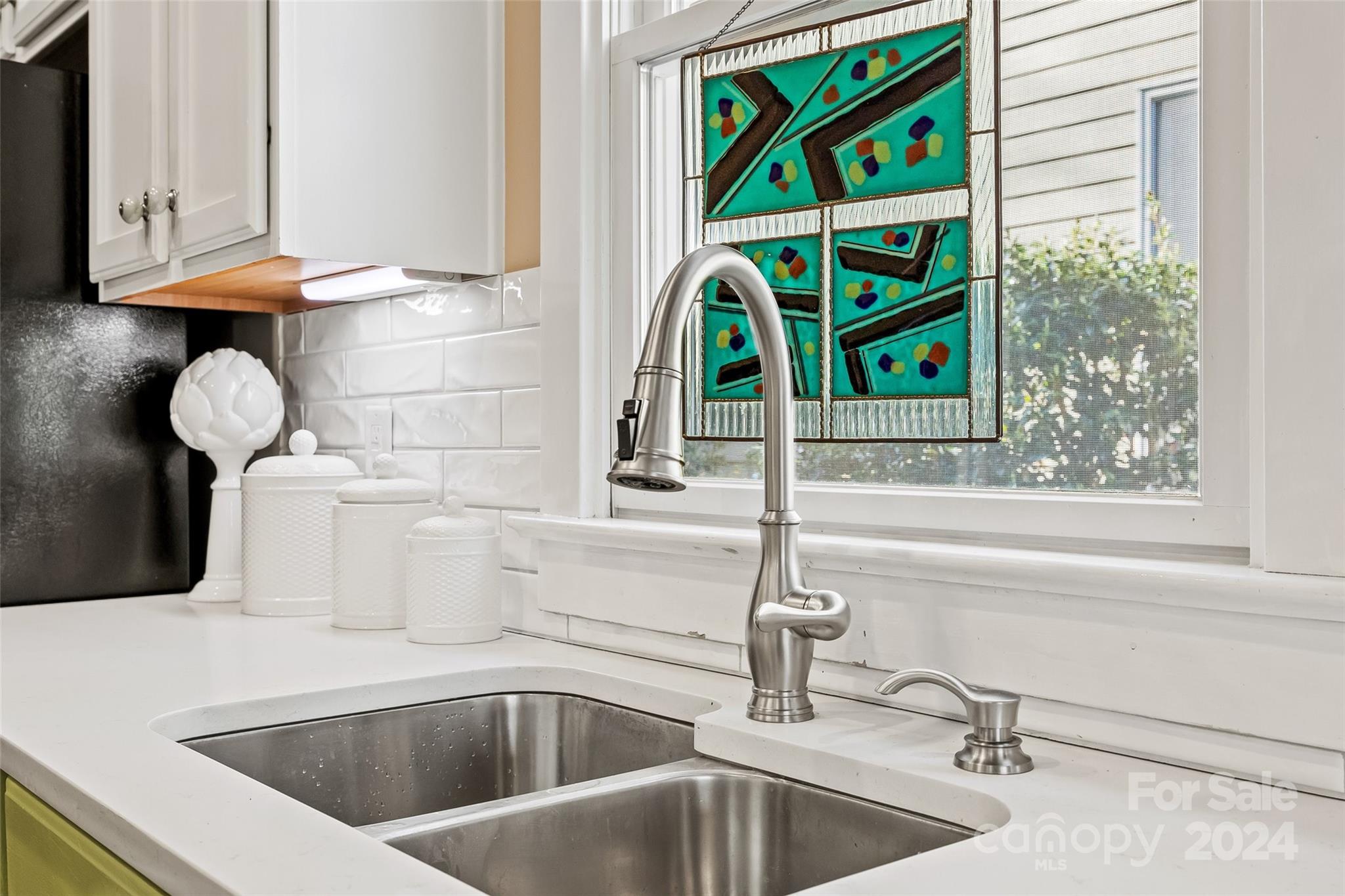 422 Bull Finch Bend Fort Mill, SC 29708 - Photo 14 of 48 a kitchen with a sink and a window