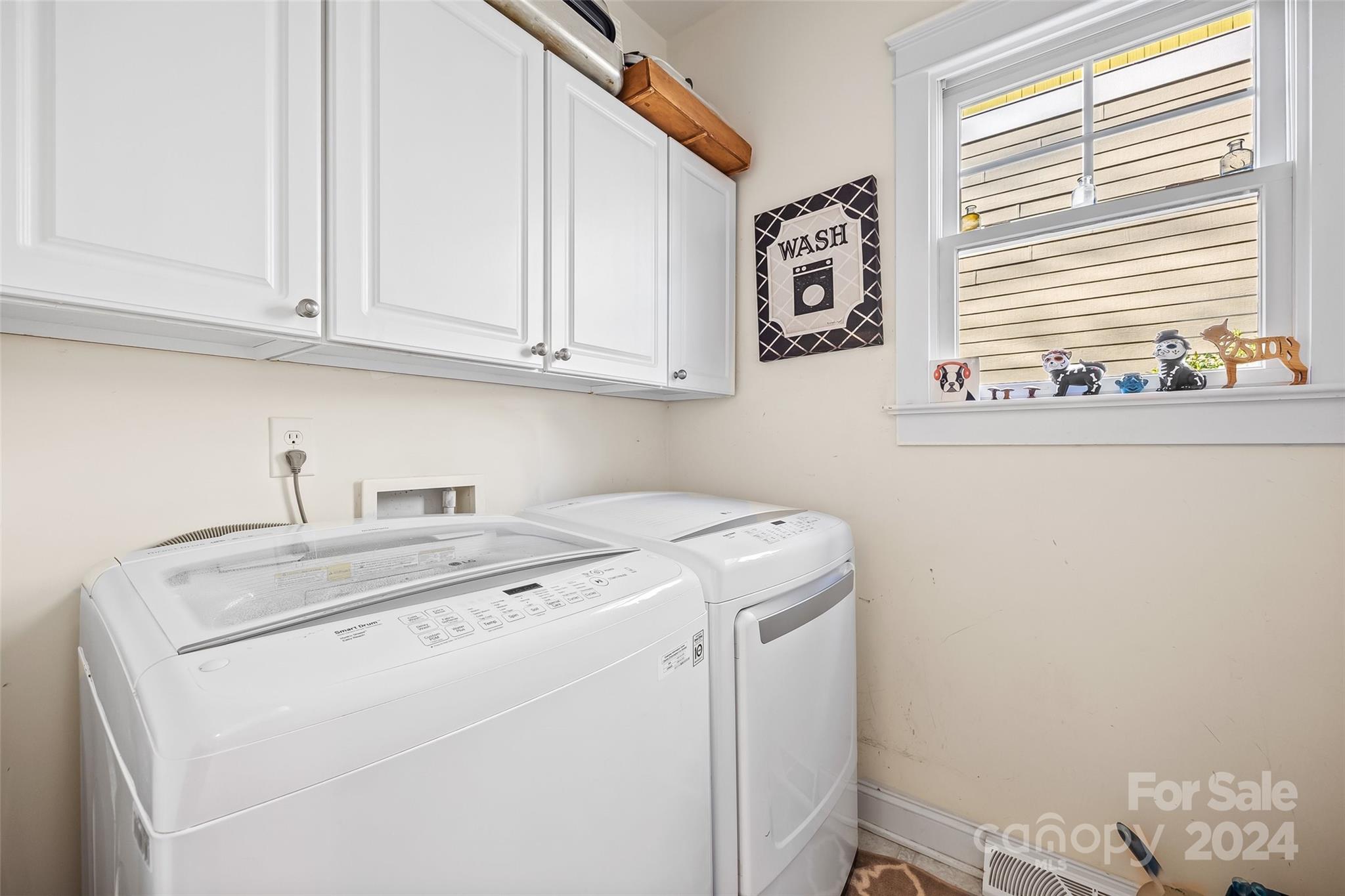 422 Bull Finch Bend Fort Mill, SC 29708 - Photo 16 of 48 a utility room with dryer and washer