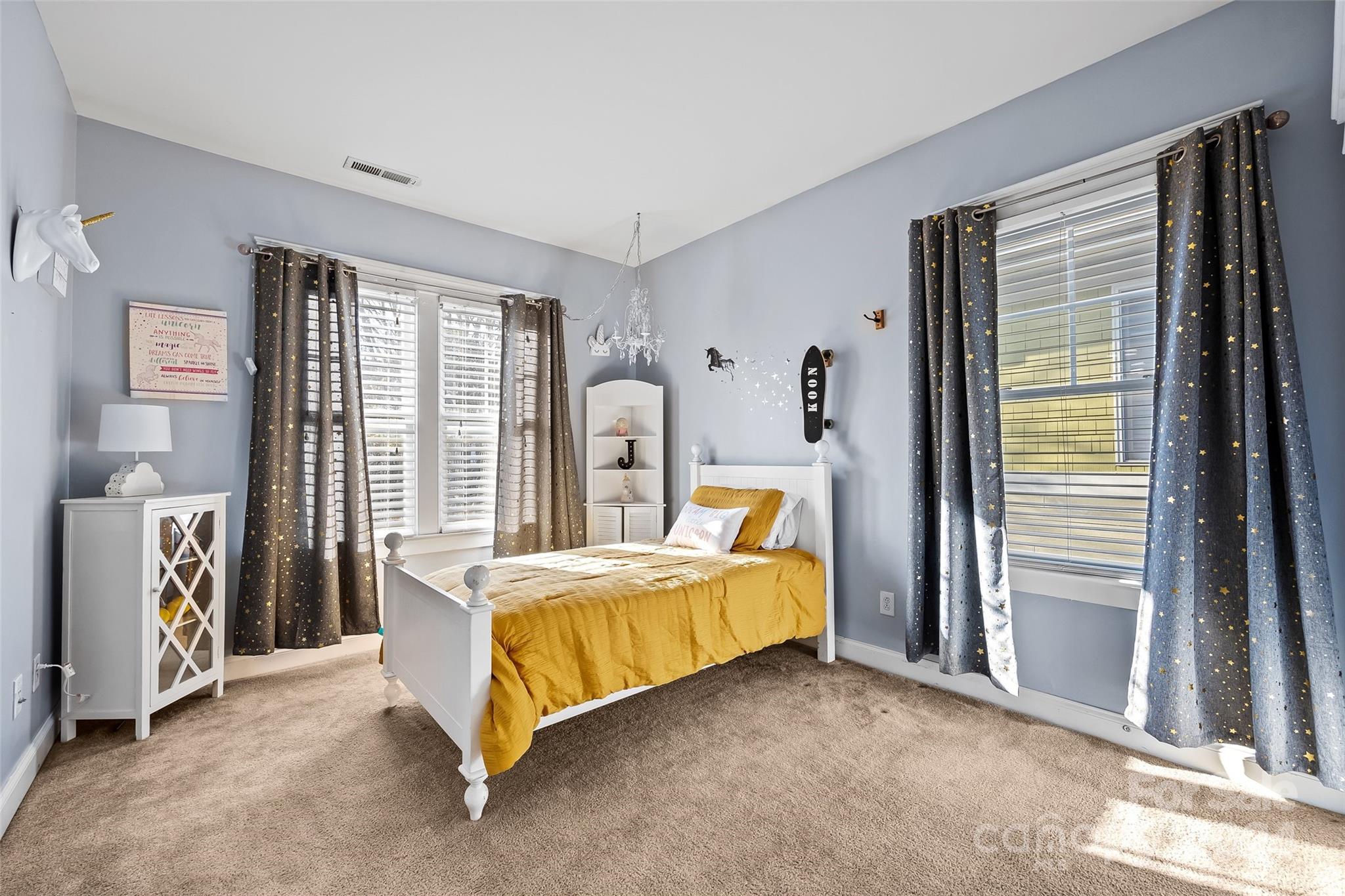 422 Bull Finch Bend Fort Mill, SC 29708 - Photo 21 of 48 a bedroom with a bed and a refrigerator