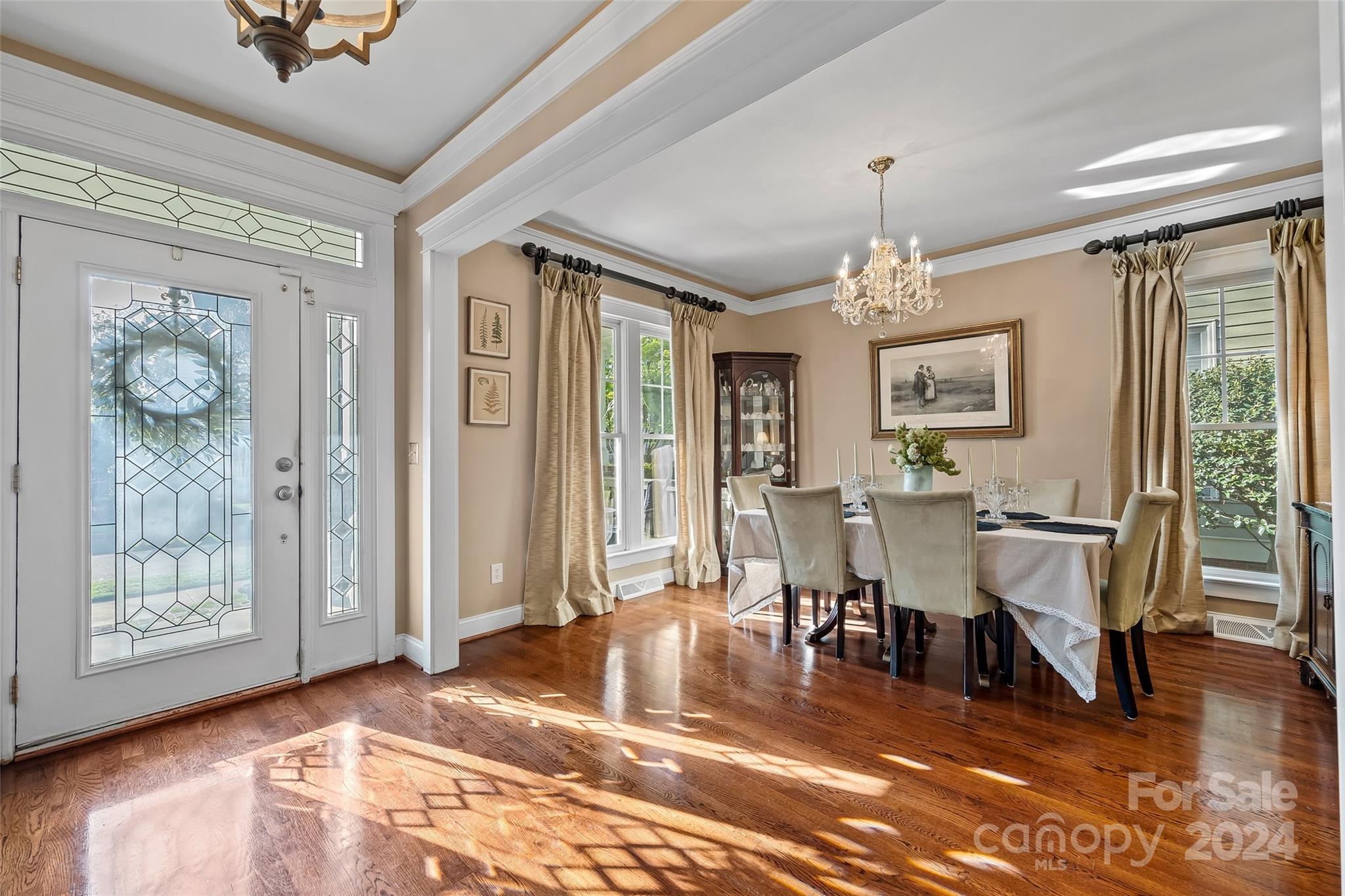 422 Bull Finch Bend Fort Mill, SC 29708 - Photo 4 of 48 a view of a dining room with furniture window and wooden floor