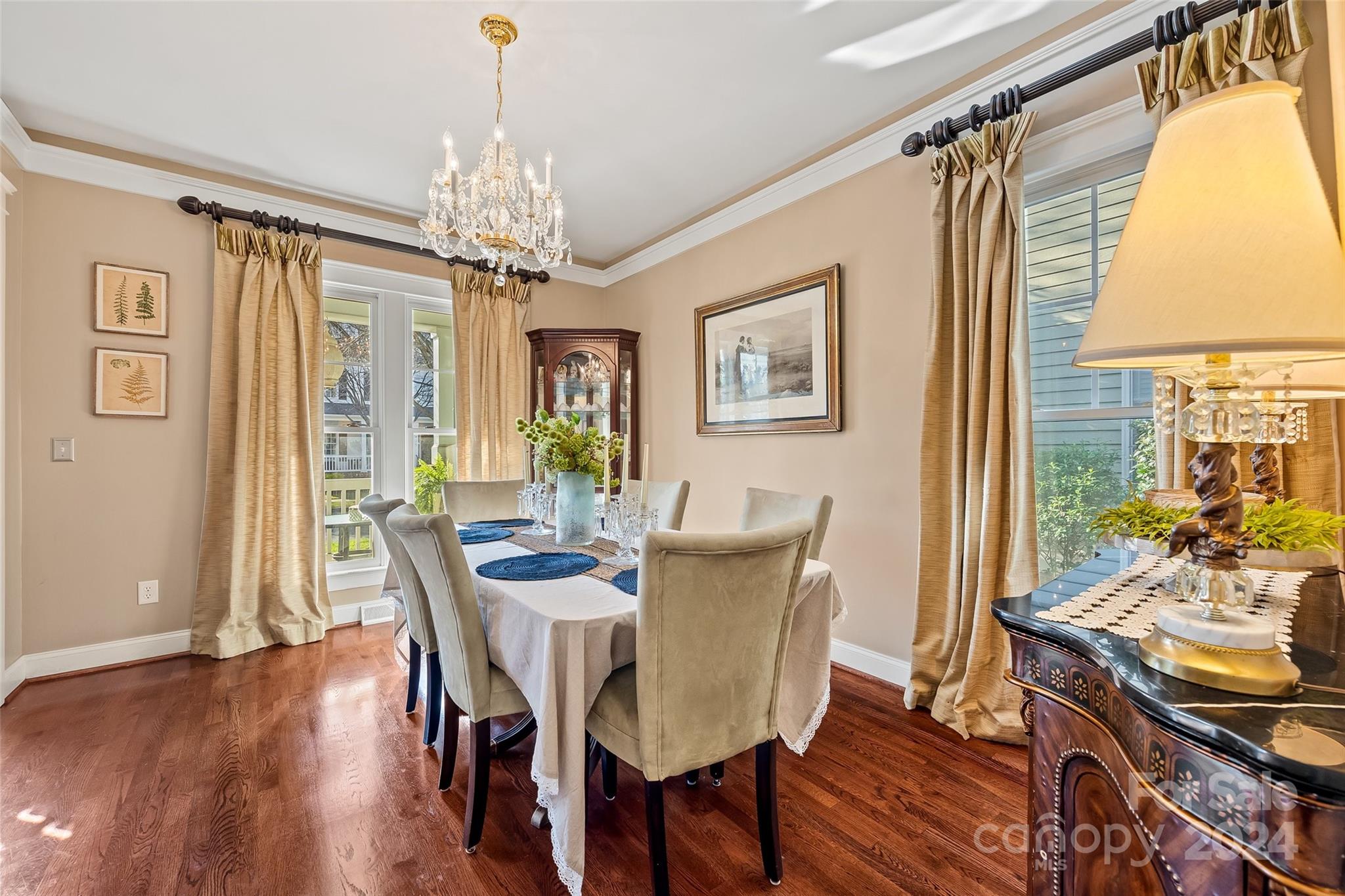 422 Bull Finch Bend Fort Mill, SC 29708 - Photo 6 of 48 a view of a dining room with furniture window and wooden floor