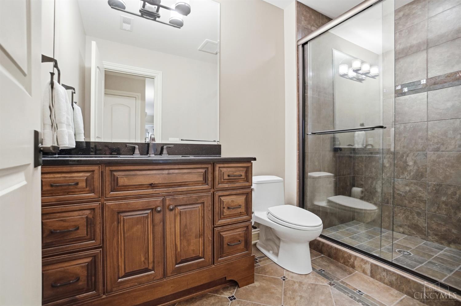 4535 Drake Road Cincinnati, OH 45243 - Photo 68 of 96 This full bathroom is in the lower level and can be used when exiting the pool.