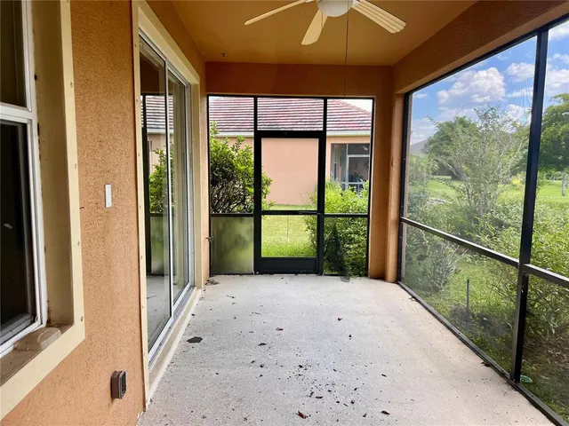 a view of a room with a large window