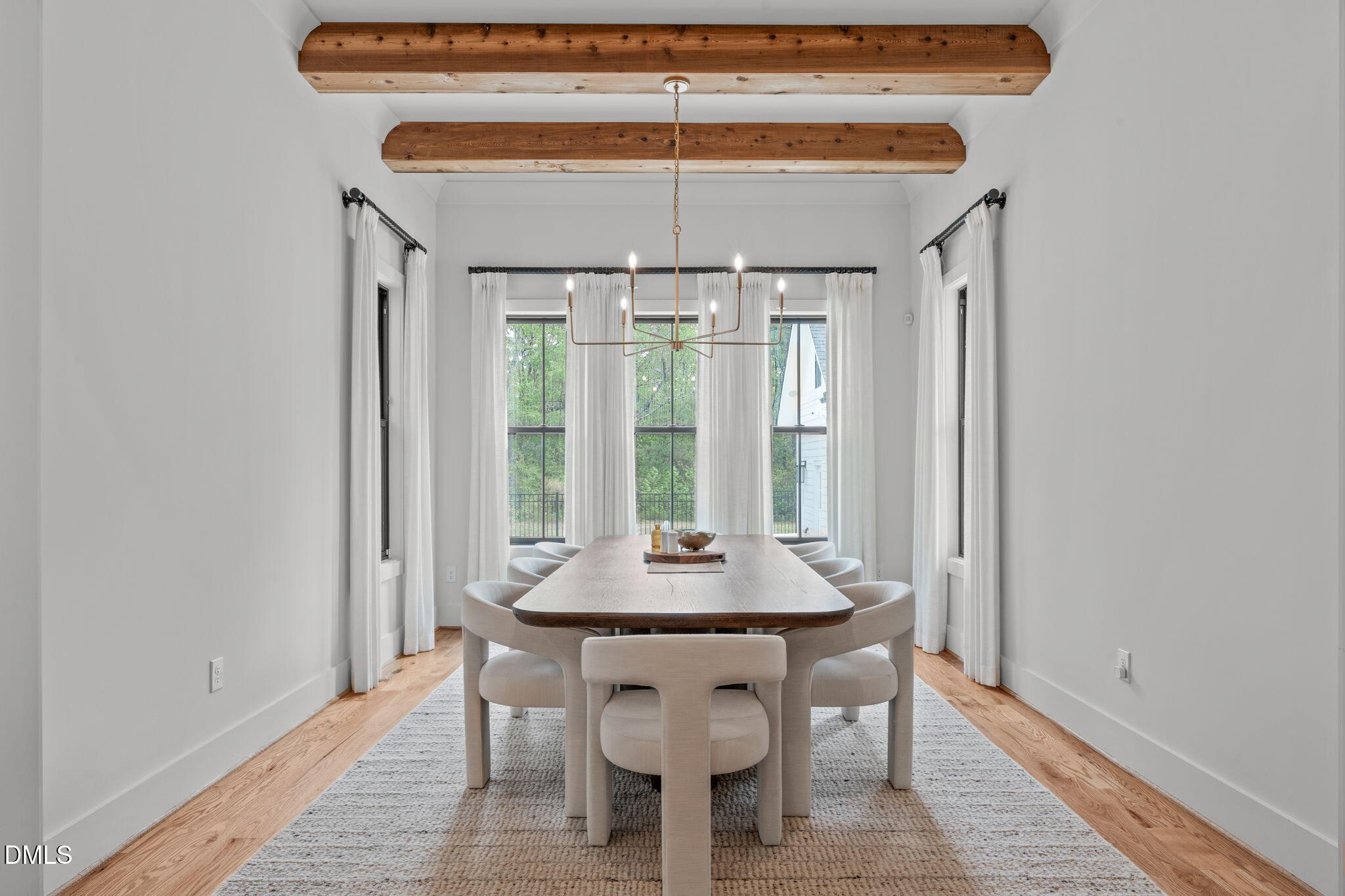 5005 Ten-Ten Road Apex, NC 27539 - Photo 14 of 60 Beams on ceiling, bright windows, sized to fit a variety of table styles and sizes.