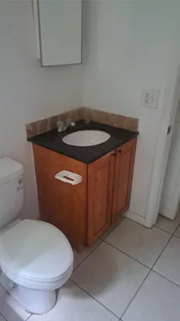 a bathroom with a sink and a toilet