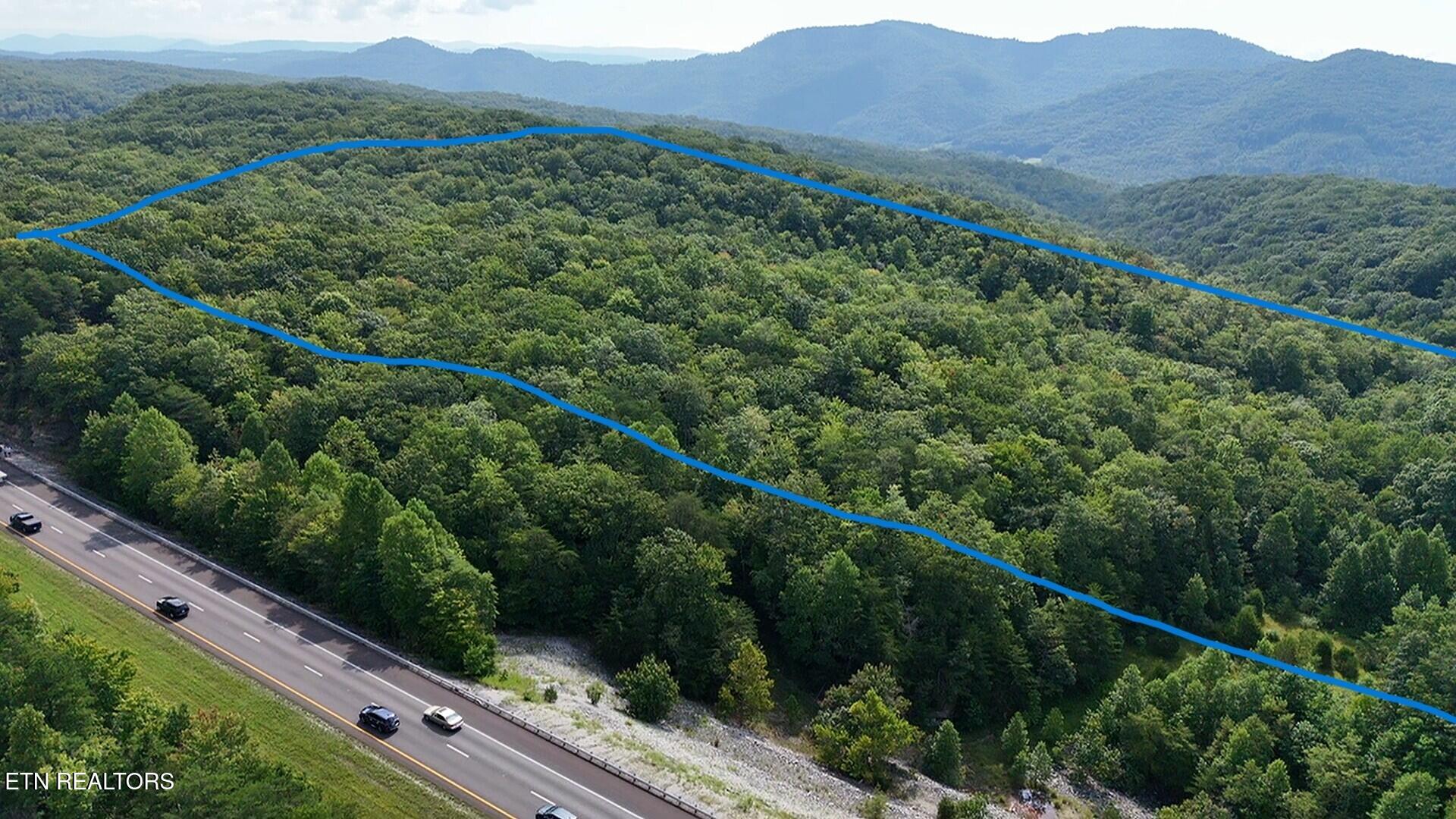 I-75 Road Pioneer, TN 37847 - Photo 2 of 11 dji_fly_20250815_105509_0_1755269709989_