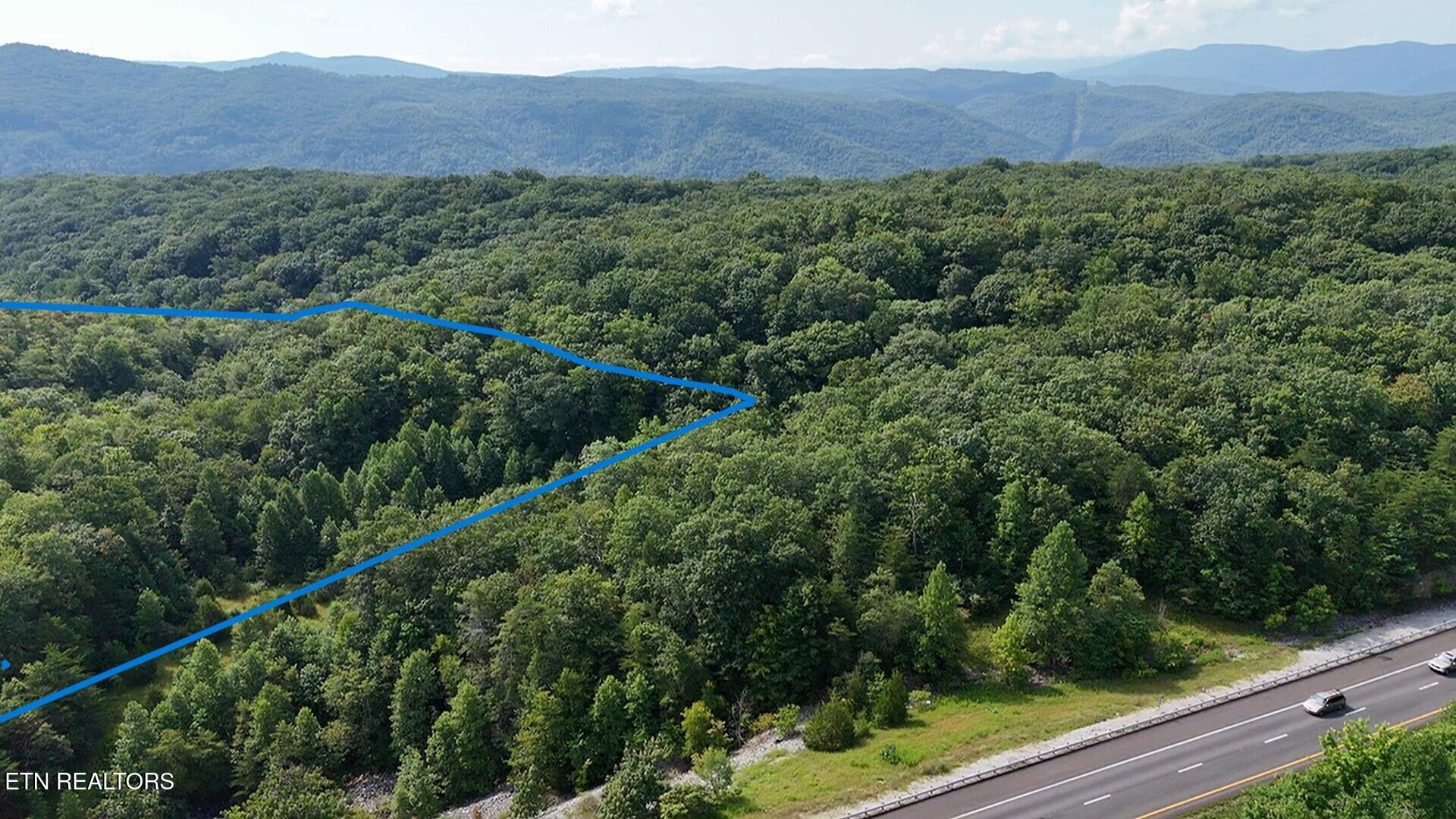 I-75 Road Pioneer, TN 37847 - Photo 3 of 11 dji_fly_20250815_105505_0_1755269705198_