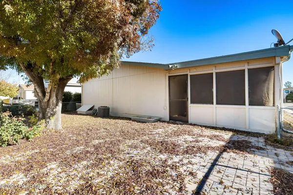 a house with trees in front of it