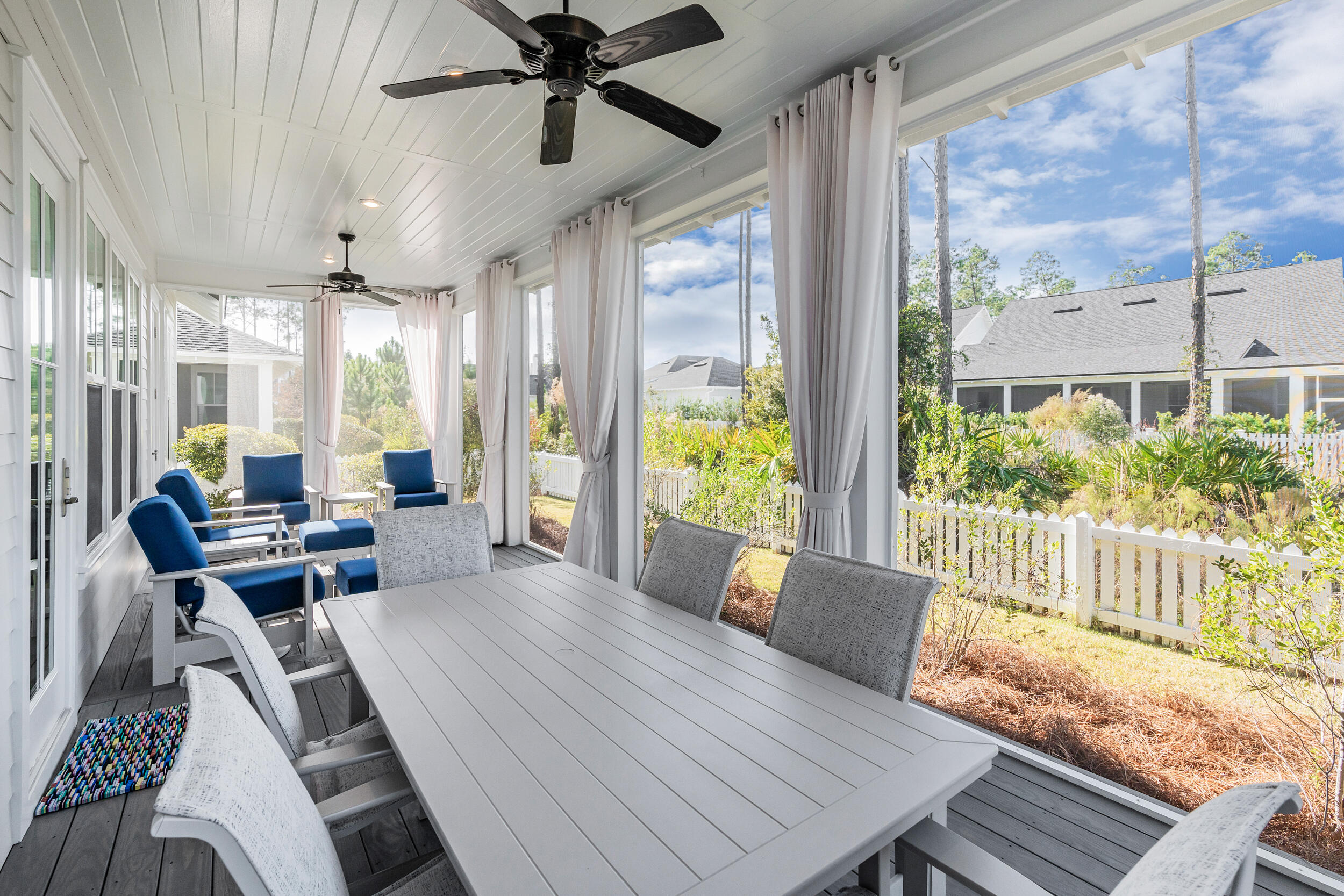 129 Firefly Way, Unit LOT 75 Watersound, FL 32461 - Photo 13 of 56 a living room with furniture and a large window