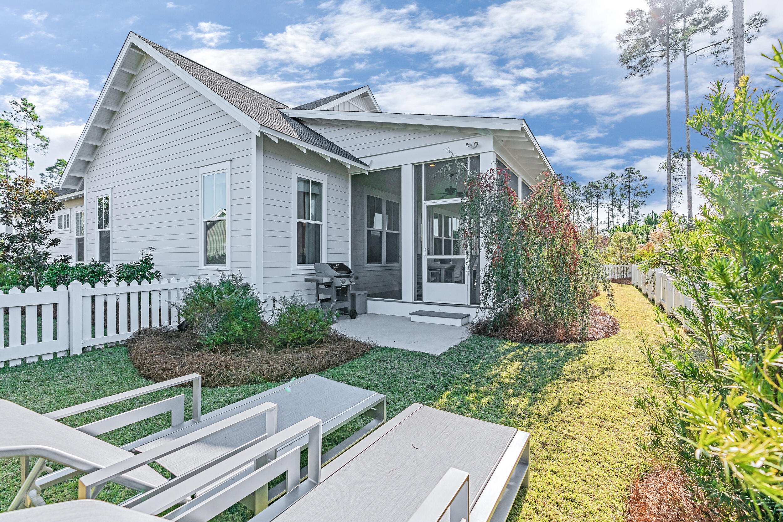 129 Firefly Way, Unit LOT 75 Watersound, FL 32461 - Photo 18 of 56 a view of an house with backyard space and garden