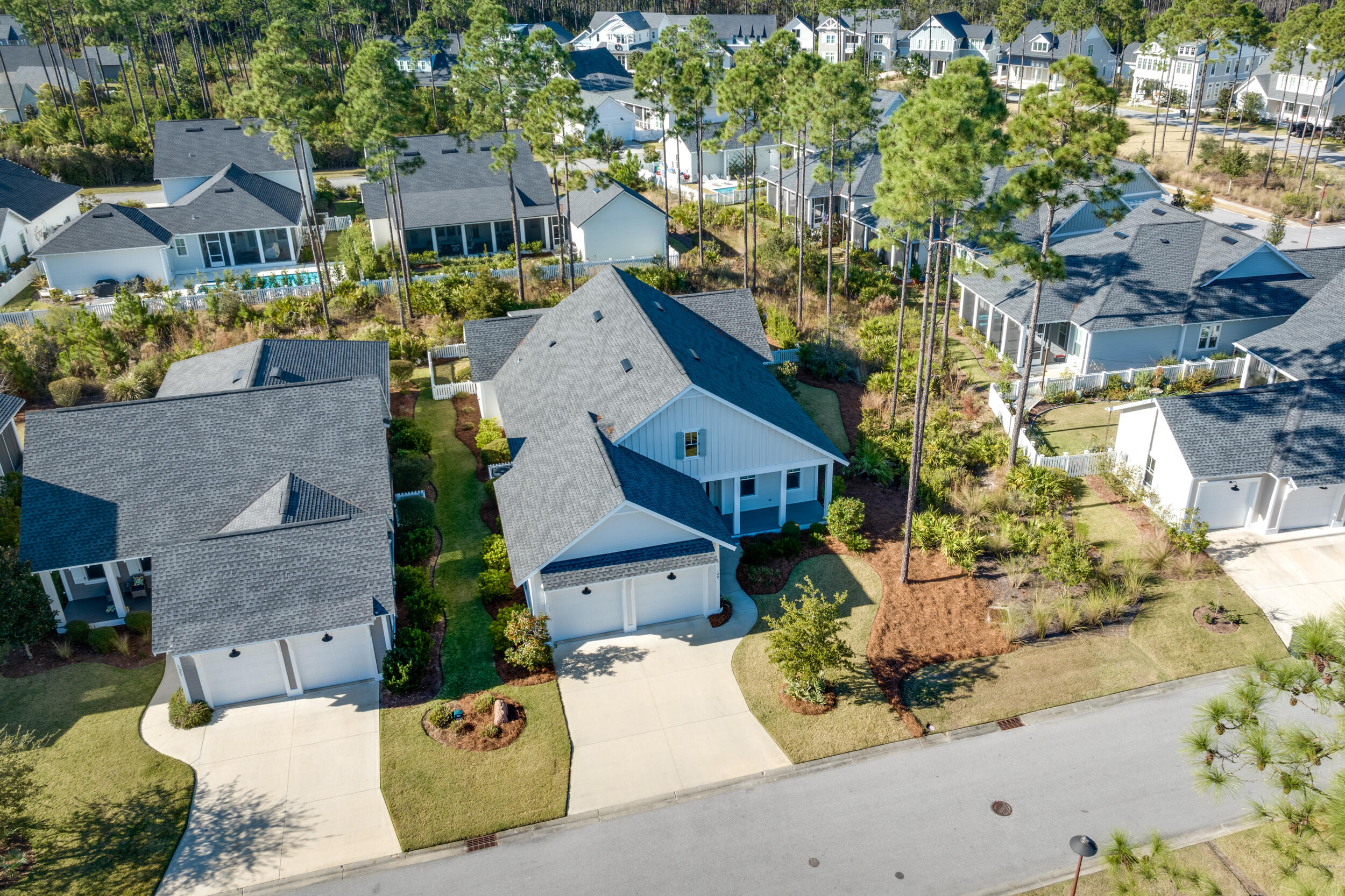 129 Firefly Way, Unit LOT 75 Watersound, FL 32461 - Photo 24 of 56 an aerial view of residential houses with outdoor space