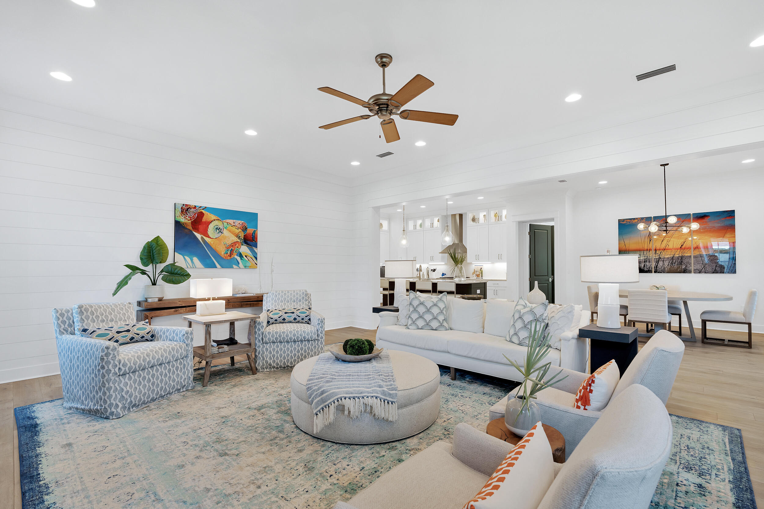 129 Firefly Way, Unit LOT 75 Watersound, FL 32461 - Photo 3 of 56 a living room with furniture and a ceiling fan
