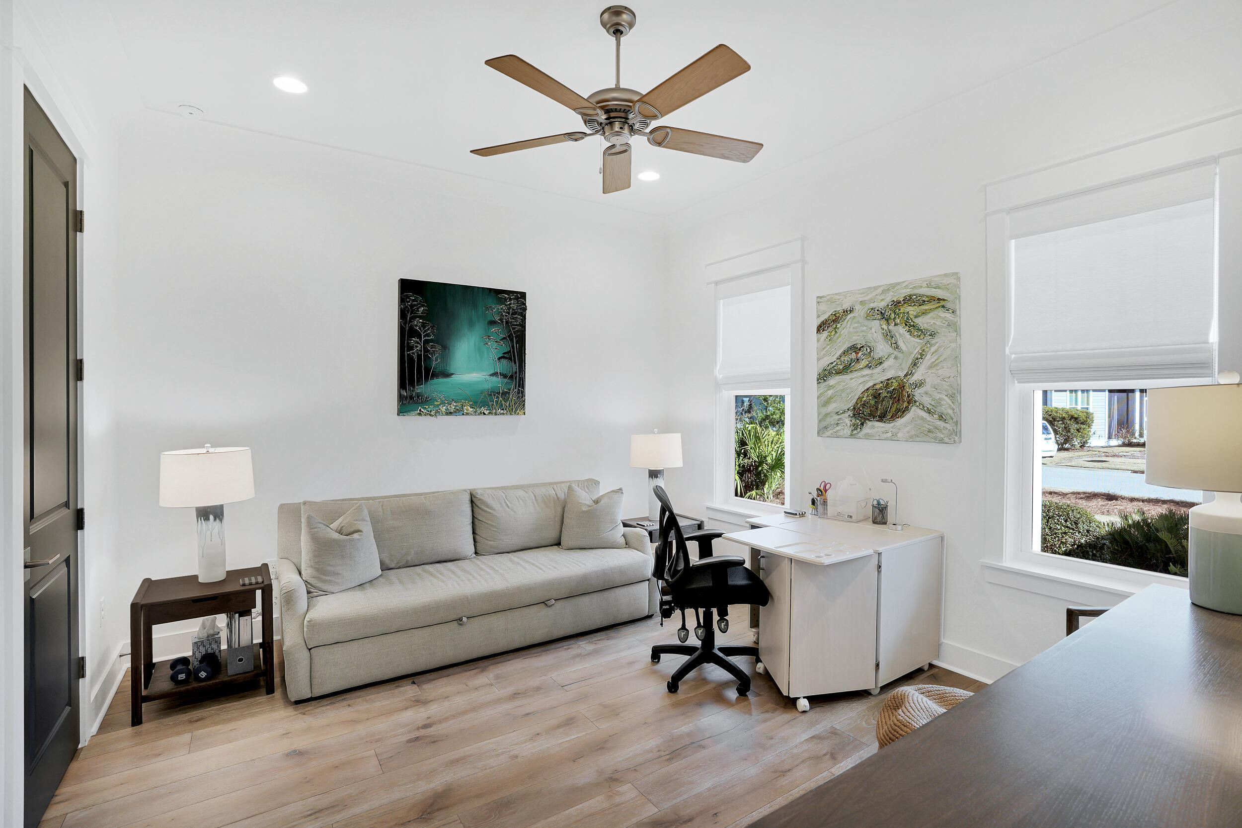 129 Firefly Way, Unit LOT 75 Watersound, FL 32461 - Photo 35 of 56 a living room with furniture and a flat screen tv