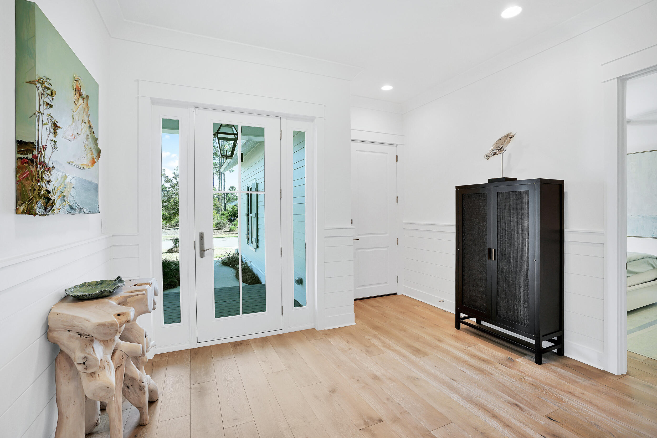 129 Firefly Way, Unit LOT 75 Watersound, FL 32461 - Photo 40 of 56 a view of a hallway view with wooden floor and staircase