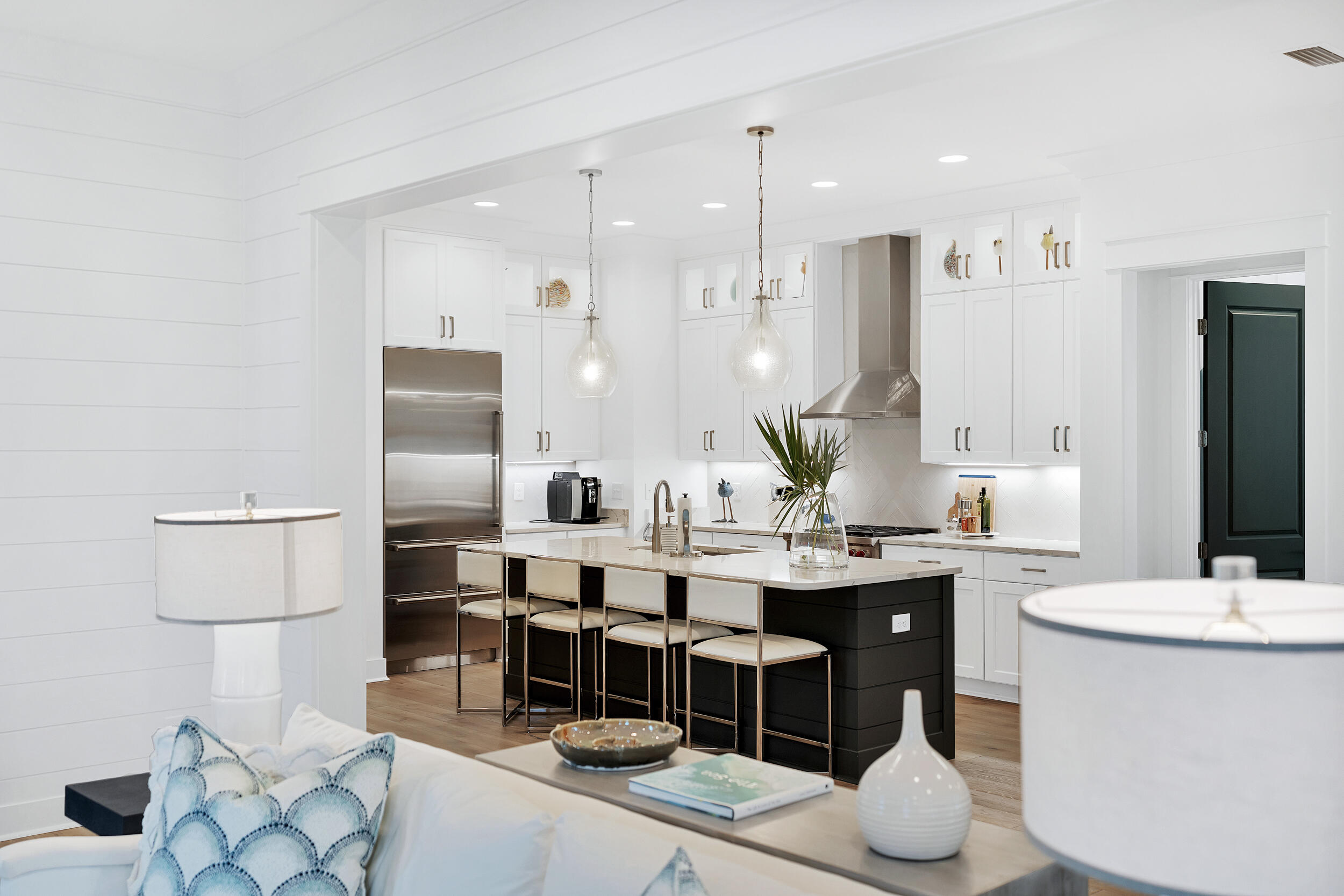 129 Firefly Way, Unit LOT 75 Watersound, FL 32461 - Photo 4 of 56 a large kitchen with a table and chairs