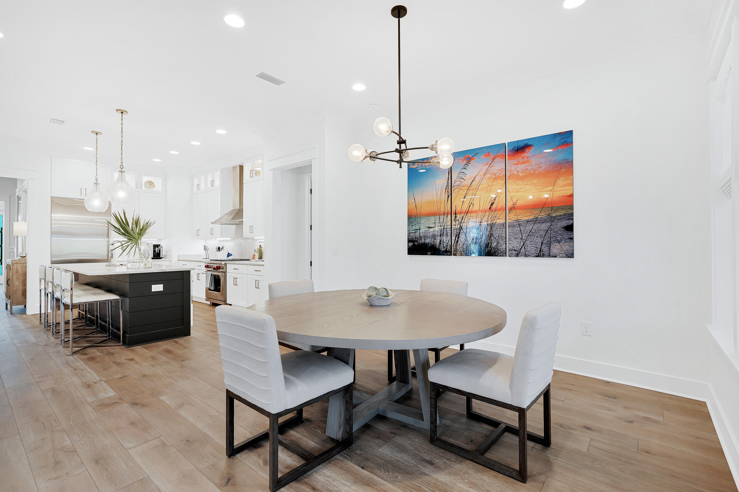 129 Firefly Way, Unit LOT 75 Watersound, FL 32461 - Photo 5 of 56 a view of a a dining room with furniture window and wooden floor